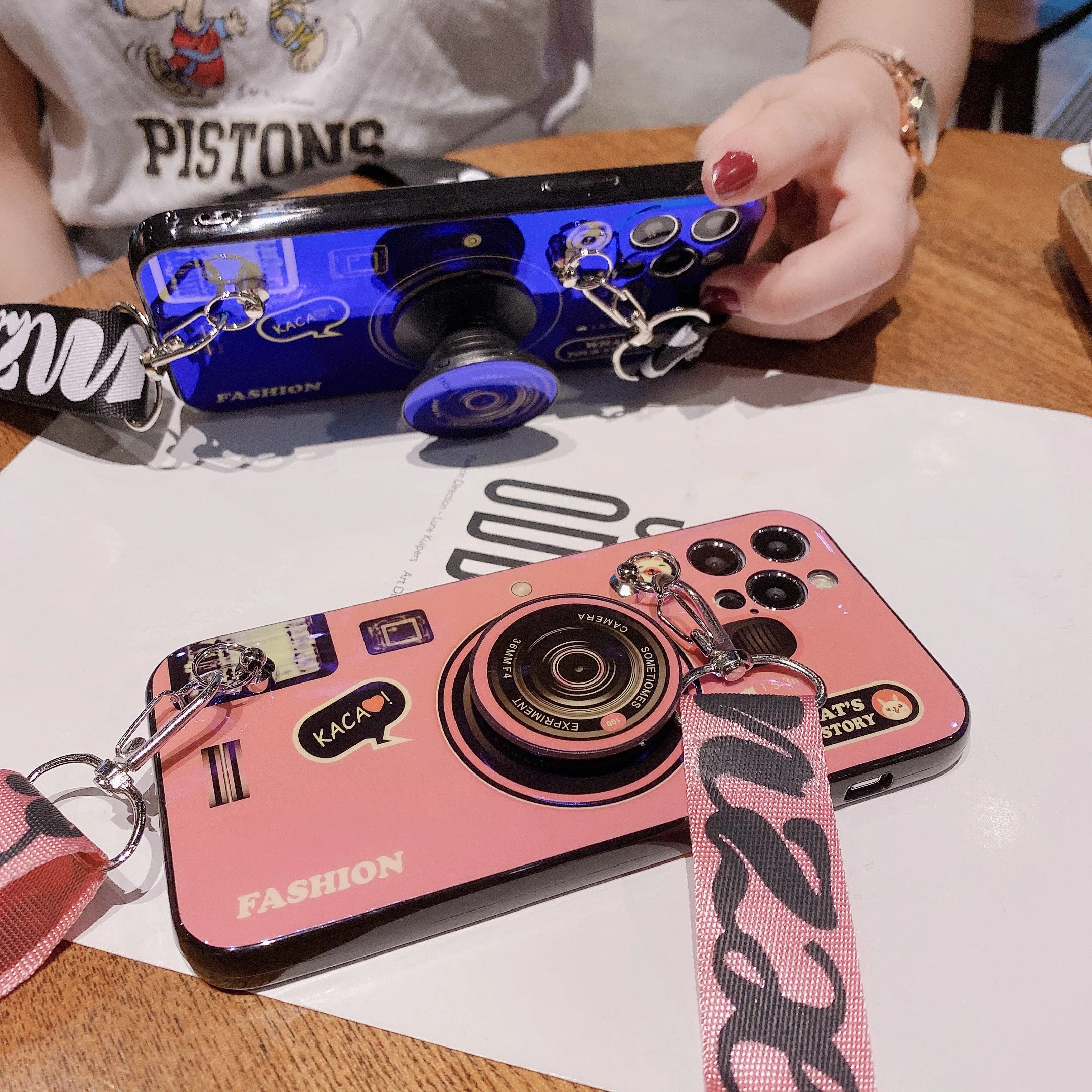 Fashion Retro Camera Fold Holder Silicone Case For Samsung A01 A11 A21 A31 A41 A51 A71 A22 A82 A50s A12 A42 A02 A32 A52 A72 A10
Fashion Retro Camera Fold Holder Silicone Case For Samsung A01 A11 A21 A31 A41 A51 A71 A22 A82 A50s A12 A42 A02 A32 A52 A72 A10