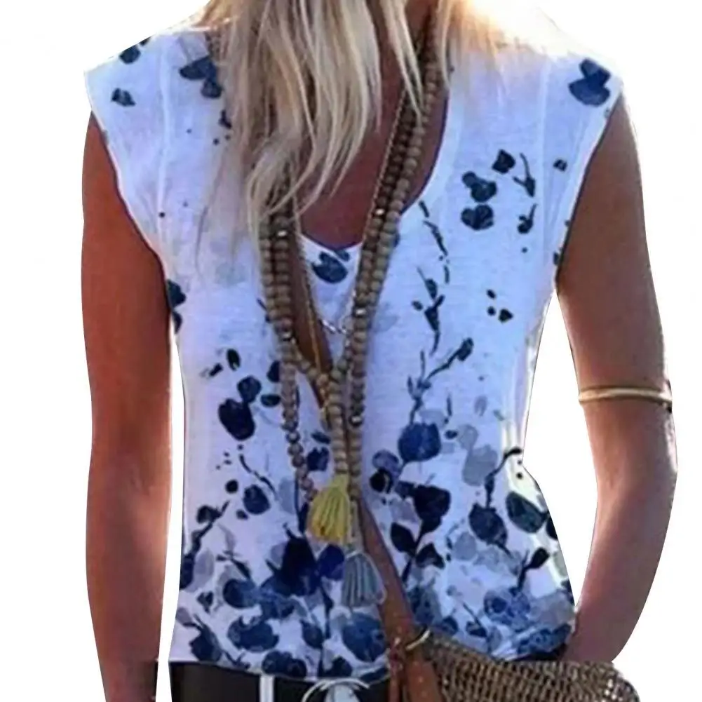 Блузка женская свободного покроя с цветочным принтом и V-образным вырезом 
Блузка женская свободного покроя с цветочным принтом и V-образным вырезом