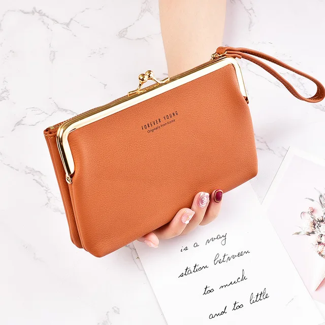 Women's Wallet 2021 new simple PU soft leather clutch with wrist zip lock mobile phone bag
Women's Wallet 2021 new simple PU soft leather clutch with wrist zip lock mobile phone bag