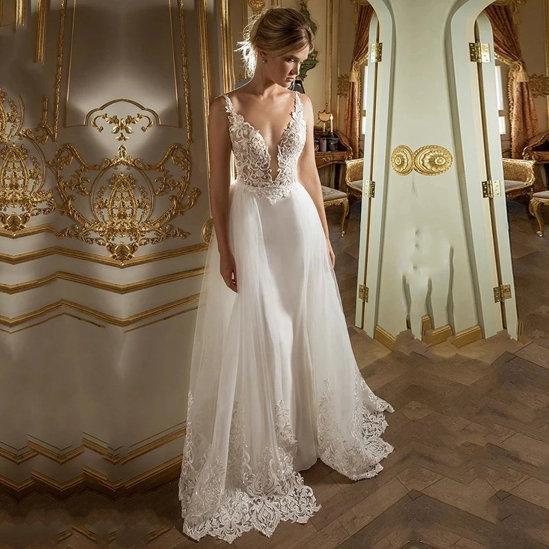 Elegant Vestidos De Novia Boho Wedding Dresses 2021 A-Line Deep V Neck Tulle Appliqued Cheap Backless Bridal Gown Robe De Mariee
Elegant Vestidos De Novia Boho Wedding Dresses 2021 A-Line Deep V Neck Tulle Appliqued Cheap Backless Bridal Gown Robe De Mariee