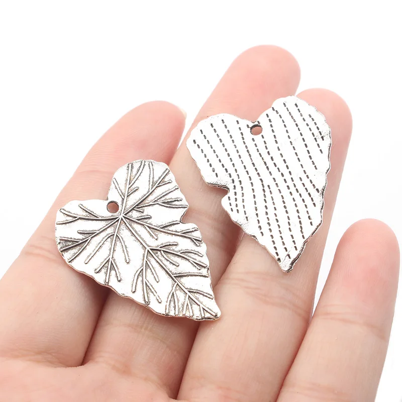 5pcs/lot Zinc Alloy Leaf Earring Pendant Heart Leaves Necklace DIY Jewelry Making Accessories Birthday Gifts 26*33mm
5pcs/lot Zinc Alloy Leaf Earring Pendant Heart Leaves Necklace DIY Jewelry Making Accessories Birthday Gifts 26*33mm