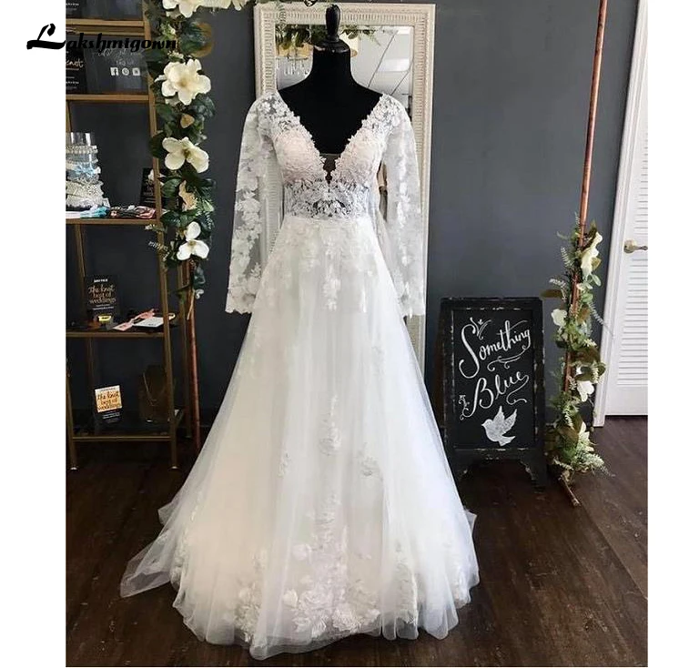 Lakshmigown Свадебные платья-трапеции цвета слоновой кости с длинным рукавом и V-образным вырезом
Lakshmigown Свадебные платья-трапеции цвета слоновой кости с длинным рукавом и V-образным вырезом