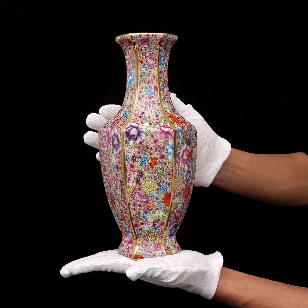Jingdezhen antique handicrafts Qing Dynasty Qianlong enamel Golden Hexagonal flowers vase antique collection ornaments
Jingdezhen antique handicrafts Qing Dynasty Qianlong enamel Golden Hexagonal flowers vase antique collection ornaments