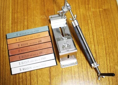 Ruixin Pro Lansky Sharpener With 4pcs Stones Tool Sharpening Machine Tool Kitchen Knives Sharpening Machine Sharpening System.
Ruixin Pro Lansky Sharpener With 4pcs Stones Tool Sharpening Machine Tool Kitchen Knives Sharpening Machine Sharpening System.