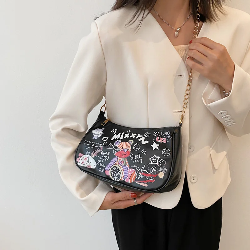 Graffiti Bear Bag Female Summer New Fashion One Shoulder Armpit Bag Leisure Design Messenger Bag
Graffiti Bear Bag Female Summer New Fashion One Shoulder Armpit Bag Leisure Design Messenger Bag