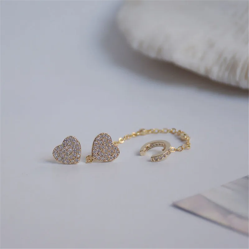 Korea 14K Gold Inlaid Zircon Heart Design Sense Asymmetrical Ear Clip Woman Fashion Bling Crystal Stud Earrings Jewelry Pendant
Korea 14K Gold Inlaid Zircon Heart Design Sense Asymmetrical Ear Clip Woman Fashion Bling Crystal Stud Earrings Jewelry Pendant