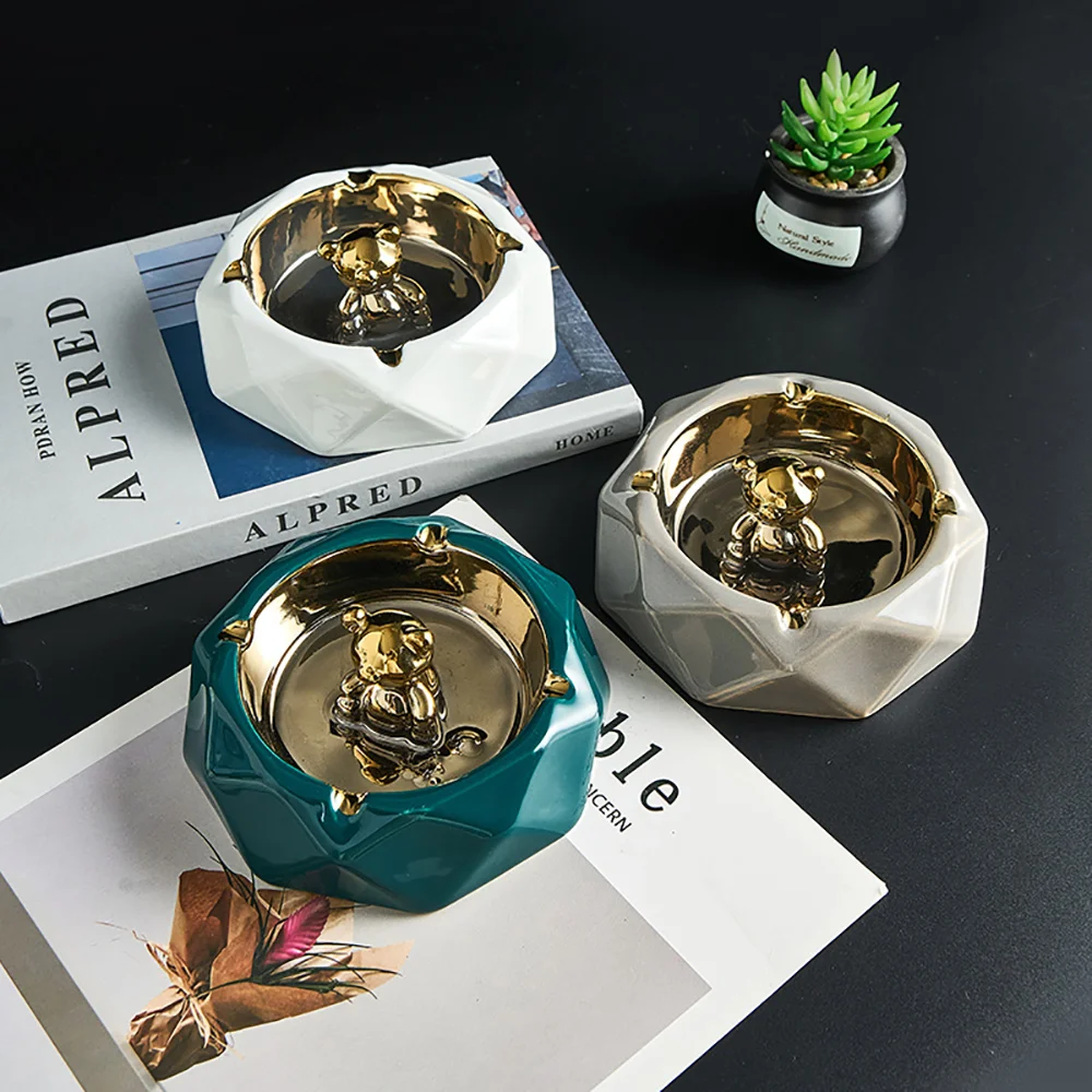 Modern and simple ceramic small golden bear portable ashtray home decoration living room bedroom office desktop Ornaments gift
Modern and simple ceramic small golden bear portable ashtray home decoration living room bedroom office desktop Ornaments gift