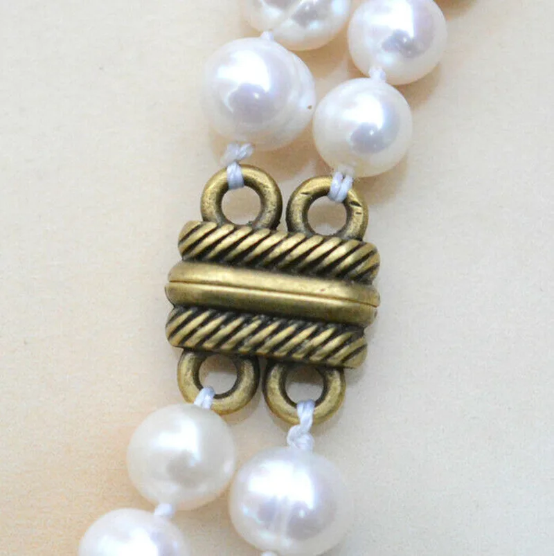 New 2 row natural 7-8mm south sea white pearl necklace antique magnetic buckle 
New 2 row natural 7-8mm south sea white pearl necklace antique magnetic buckle