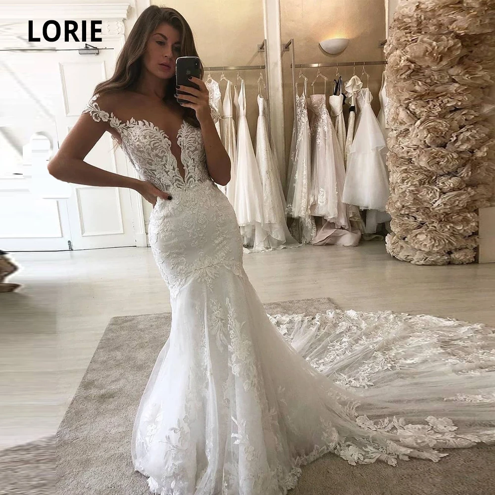 LORIE 2020 Deep V-neck Mermaid Wedding Dresses Lace Appliques with Tulle Bridal Gowns Cap Sleeve Backless Plus Size Marriage
LORIE 2020 Deep V-neck Mermaid Wedding Dresses Lace Appliques with Tulle Bridal Gowns Cap Sleeve Backless Plus Size Marriage