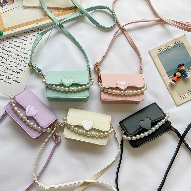 Kids Mini Purses and Handbags Leather Crossbody Bags for Women Small Coin Wallet Pouch Baby Girls Party Pearl Hand Bag Purse
Kids Mini Purses and Handbags Leather Crossbody Bags for Women Small Coin Wallet Pouch Baby Girls Party Pearl Hand Bag Purse