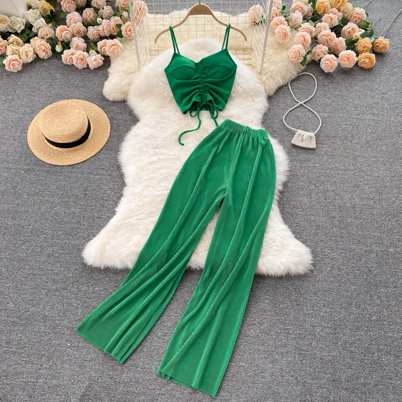 Vacation style Pants suit women's summer new sling top sexy high-waist pleated wide-leg pants fashiona beach two-piece sets
Vacation style Pants suit women's summer new sling top sexy high-waist pleated wide-leg pants fashiona beach two-piece sets