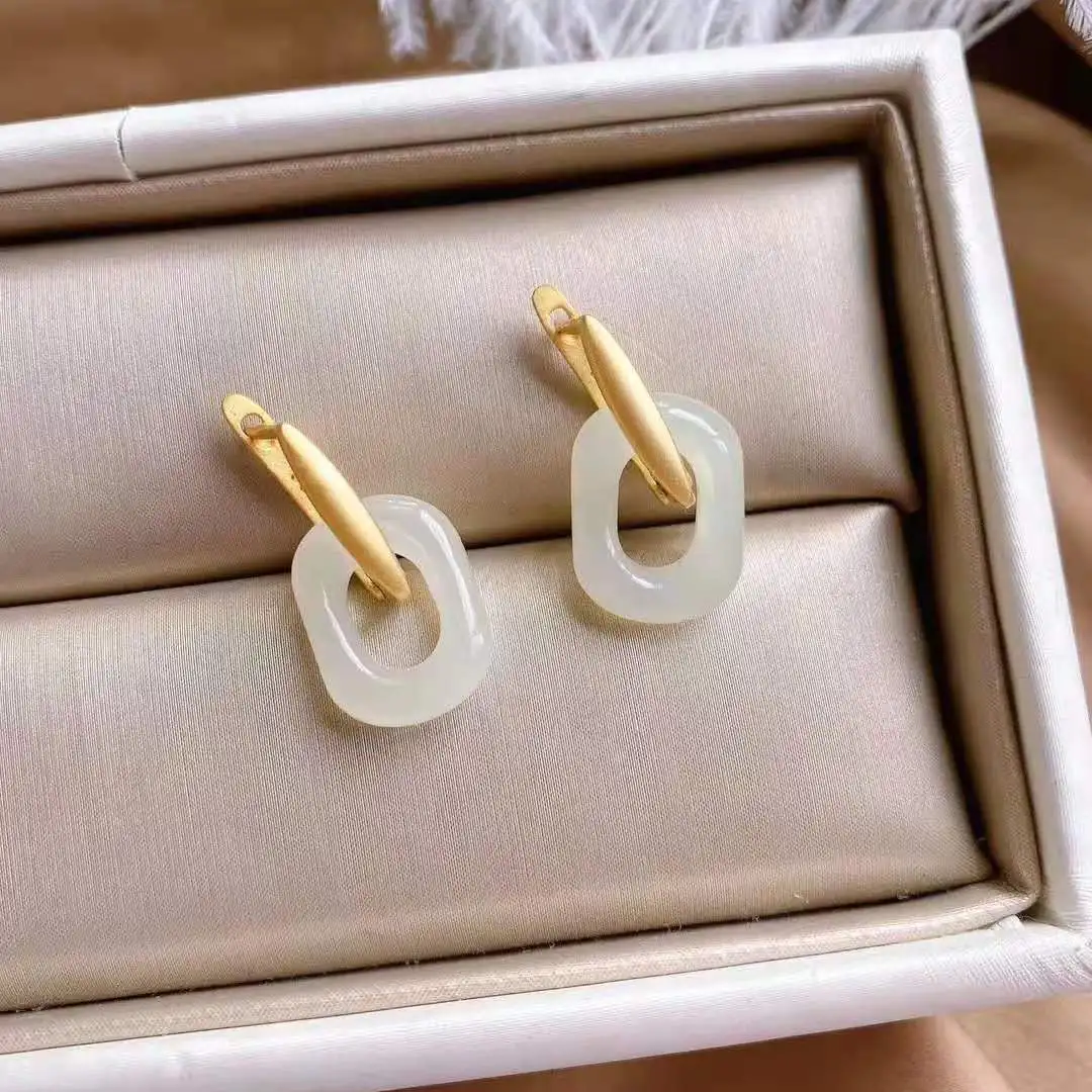 Natural Hetian Jade Buckle Simple and Elegant Delicate Earrings Simple Big Name S925 Sterling Silver Gilding Frosted Silver Earr 
Natural Hetian Jade Buckle Simple and Elegant Delicate Earrings Simple Big Name S925 Sterling Silver Gilding Frosted Silver Earr