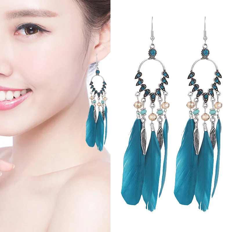 Bohemian Fashion Women's Long Earrings Feather Tassel Retro Long Earrings Rhinestone Chain Thai Wedding Hook 2021
Bohemian Fashion Women's Long Earrings Feather Tassel Retro Long Earrings Rhinestone Chain Thai Wedding Hook 2021