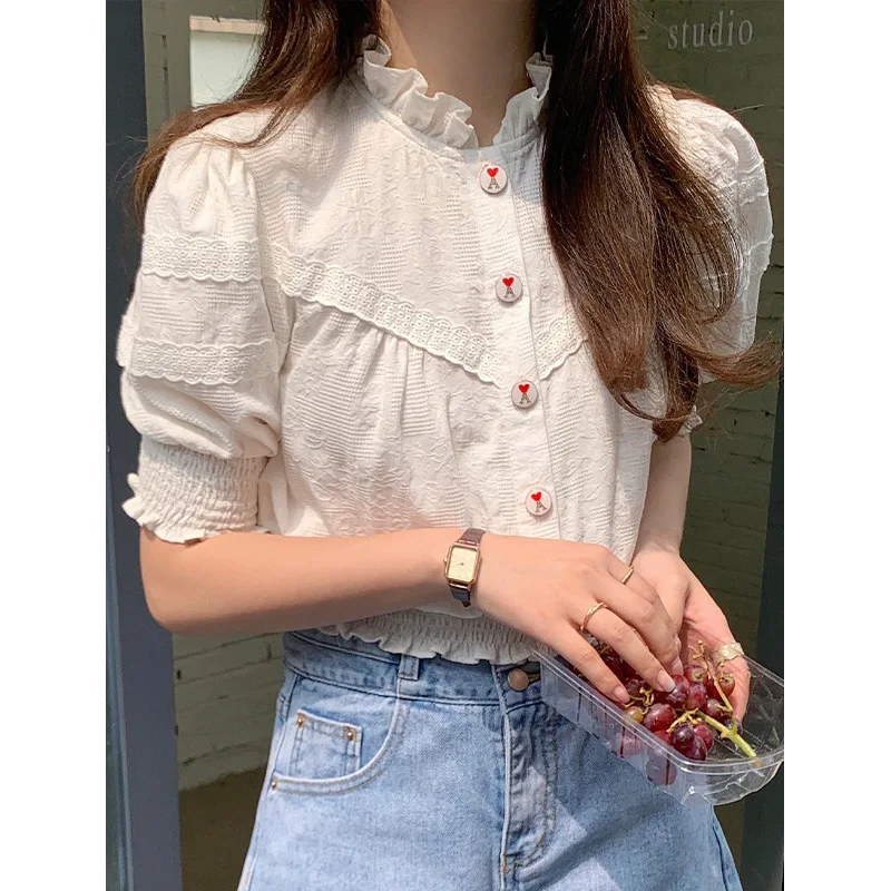 fungus edge collar shirt in the summer of 2021 new female design feeling hubble-bubble sleeve short jacket buttons
fungus edge collar shirt in the summer of 2021 new female design feeling hubble-bubble sleeve short jacket buttons