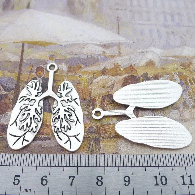 A New 30 * 40mm 5.7G Vintage Antique Double Lung Alloy charm pendant ornament DIY Jewelry Accessories DIY 25pcs/Bag 
A New 30 * 40mm 5.7G Vintage Antique Double Lung Alloy charm pendant ornament DIY Jewelry Accessories DIY 25pcs/Bag