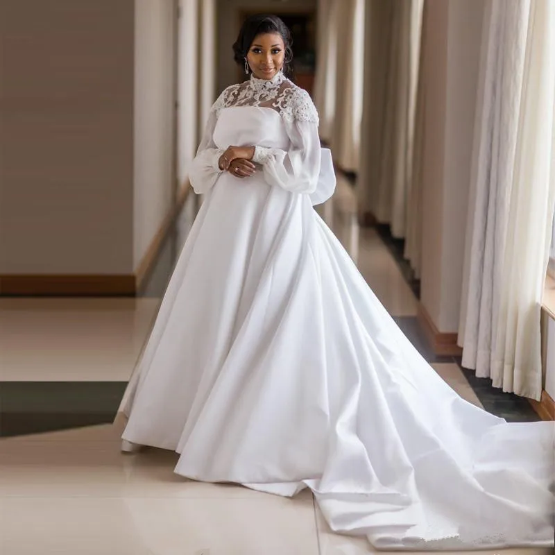 African Plus Size Wedding Dresses Satin High Collar lantern Long Sleeve Big Bow lace Wedding gowns Sash Beaded Bridal Gowns
African Plus Size Wedding Dresses Satin High Collar lantern Long Sleeve Big Bow lace Wedding gowns Sash Beaded Bridal Gowns