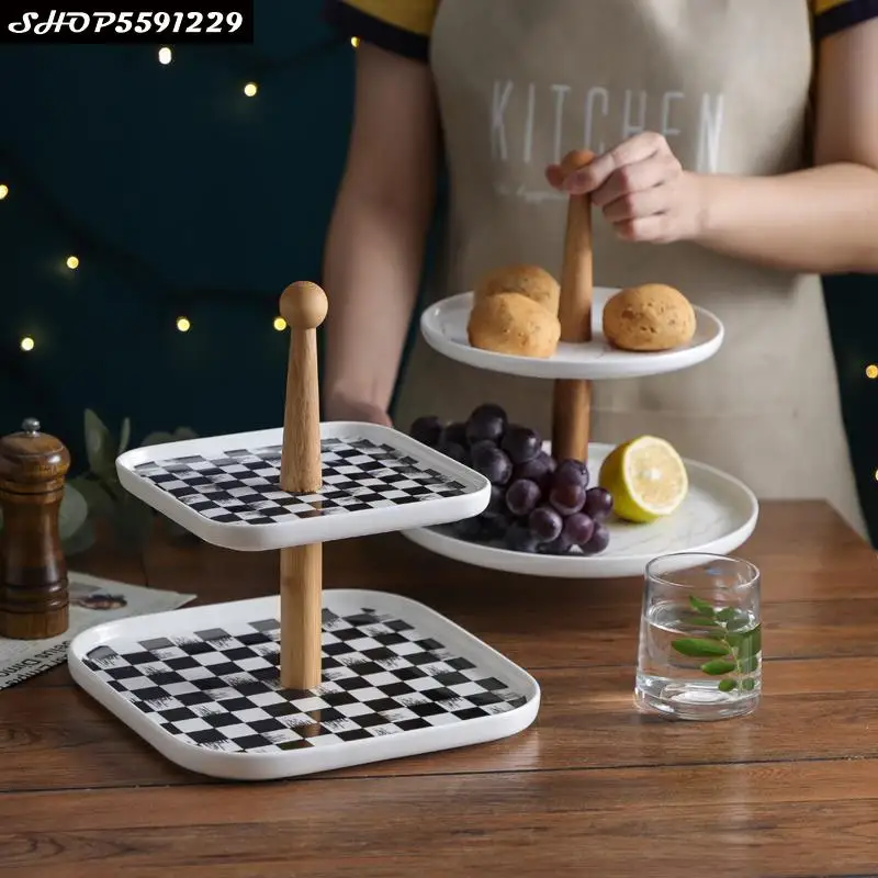 Simple Art Ceramic Double-layer Fruit Plate Luxury Gold Pattern Checkered Candy Dried Fruit Plate Home Afternoon Tea Snack Rack
Simple Art Ceramic Double-layer Fruit Plate Luxury Gold Pattern Checkered Candy Dried Fruit Plate Home Afternoon Tea Snack Rack