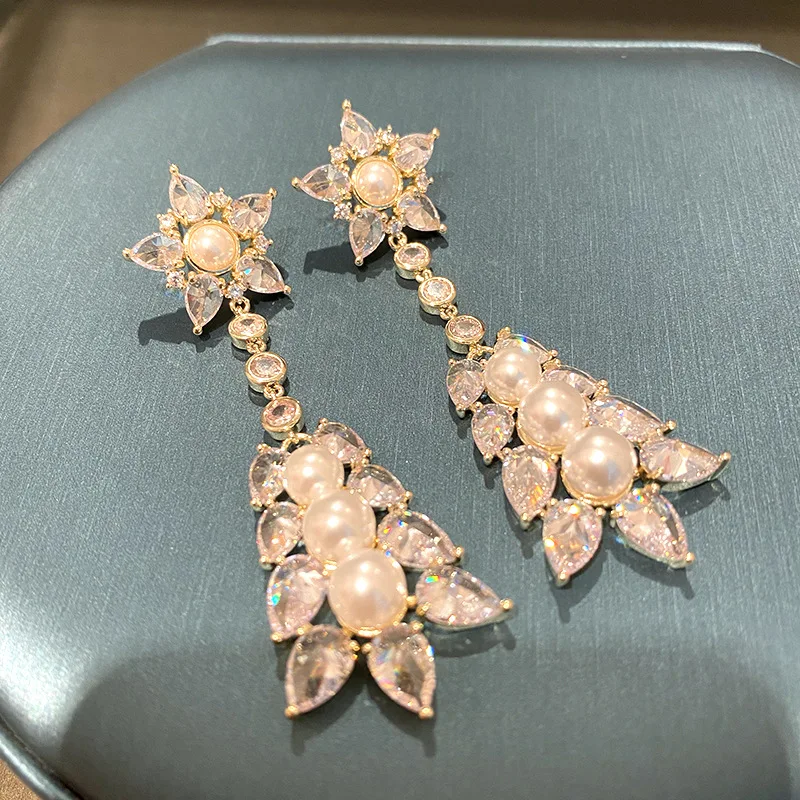 XINGX Wheat Pearl Oversized Exaggerated Inlaid Zircon Long Tassel Banquet T-Stage Studio High-Grade Female 
XINGX Wheat Pearl Oversized Exaggerated Inlaid Zircon Long Tassel Banquet T-Stage Studio High-Grade Female