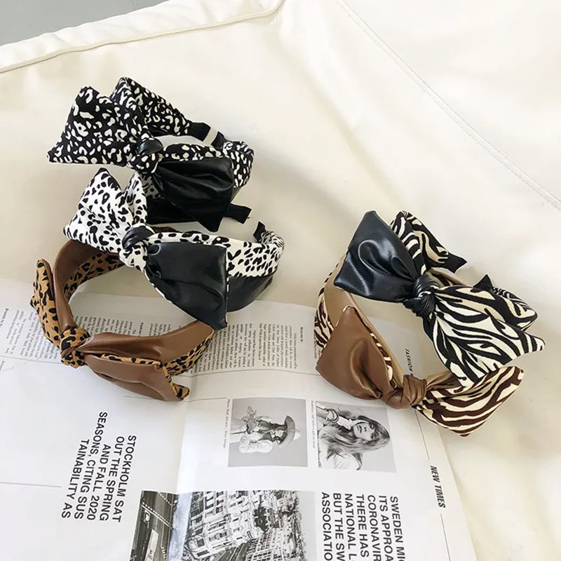 PU leather leopard print bow headbands fashion hair accessories women fabric leather stitching wide brim hair band wild headwear
PU leather leopard print bow headbands fashion hair accessories women fabric leather stitching wide brim hair band wild headwear