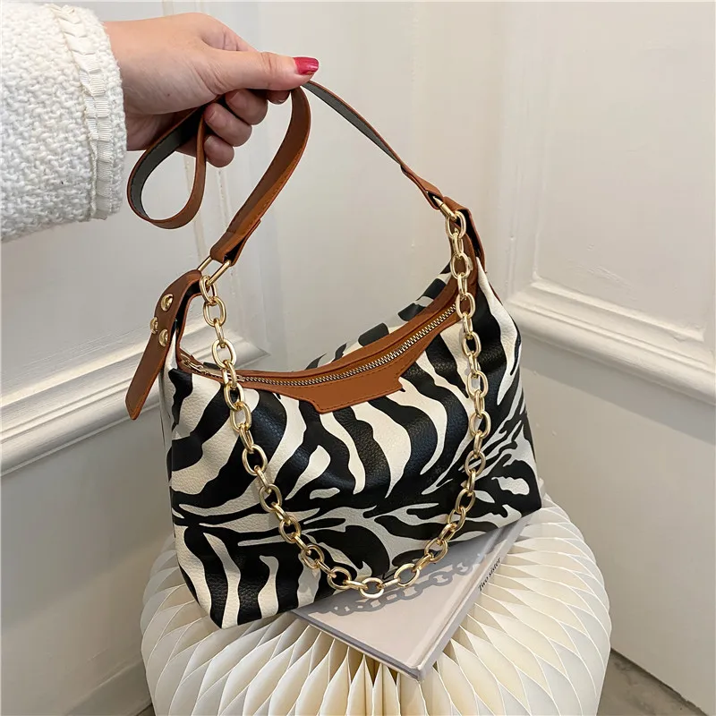 Women's bags 2021 new trendy fashion simple shoulder bag texture popular chain casual underarm bag 
Women's bags 2021 new trendy fashion simple shoulder bag texture popular chain casual underarm bag