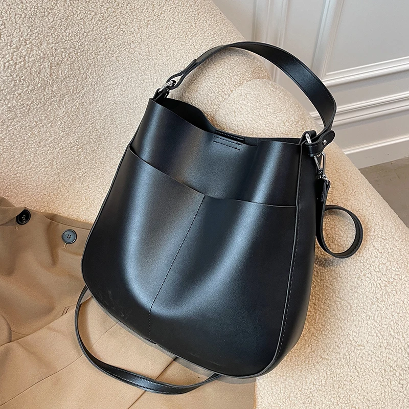 Винтажные большие сумки через плечо из мягкой искусственной кожи для женщин 2021, популярные сумки на плечо и кошельки, повседневный брендовы...
Винтажные большие сумки через плечо из мягкой искусственной кожи для женщин 2021, популярные сумки на плечо и кошельки, повседневный брендовы...