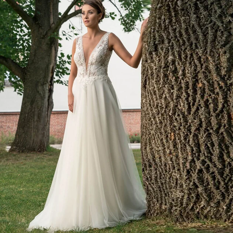 Fashion V Neck A Line Beach Wedding Dresses For Women 2021 Sexy Illusion Back Bridal Wedding Gowns Ivory Lace Tulle Hot Sale
Fashion V Neck A Line Beach Wedding Dresses For Women 2021 Sexy Illusion Back Bridal Wedding Gowns Ivory Lace Tulle Hot Sale