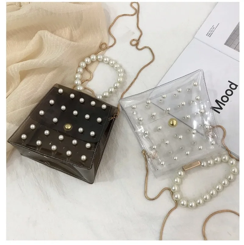 Summer Luxury Shoulder Bags Transparent Jelly PVC Crossbody Messenger Pearl Handbag Purses Small Travel Lady Waist Bag for Phone
Summer Luxury Shoulder Bags Transparent Jelly PVC Crossbody Messenger Pearl Handbag Purses Small Travel Lady Waist Bag for Phone