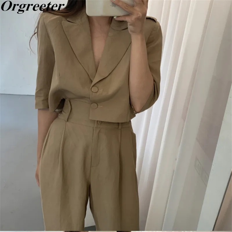 Vetement Femme 2021 Summer New Temperament Suits Korean FashionSingle-breasted Short Tops and Wide leg Pants 2 Piece Sets
Vetement Femme 2021 Summer New Temperament Suits Korean FashionSingle-breasted Short Tops and Wide leg Pants 2 Piece Sets