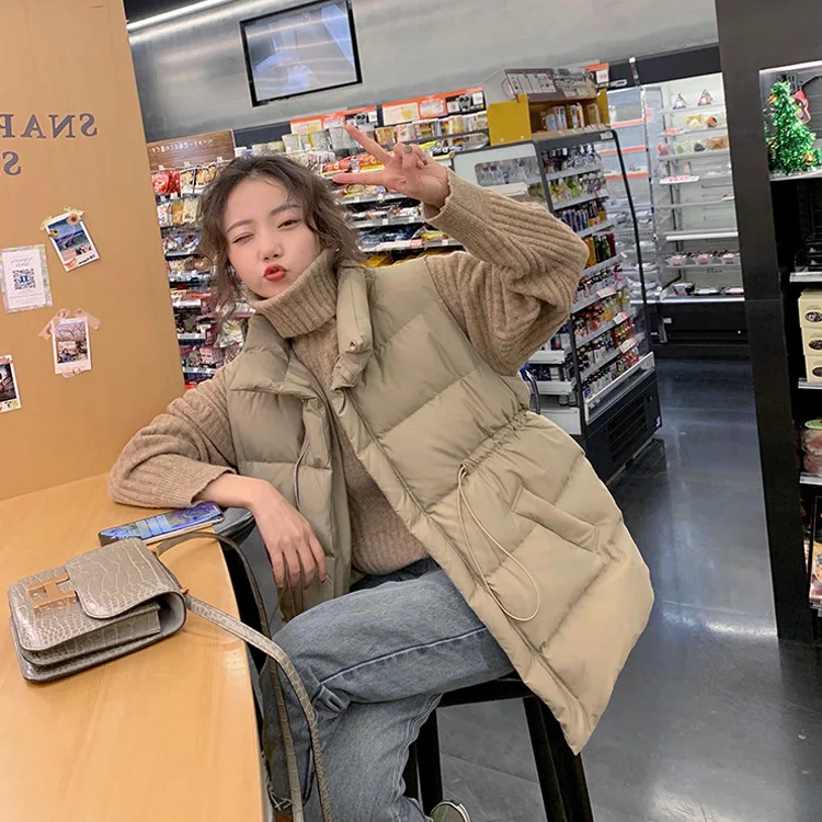 Down jacket vest solid color women 2021 winter fashion new waistcoat Korean version loose stand collar thick zipper vest trend
Down jacket vest solid color women 2021 winter fashion new waistcoat Korean version loose stand collar thick zipper vest trend