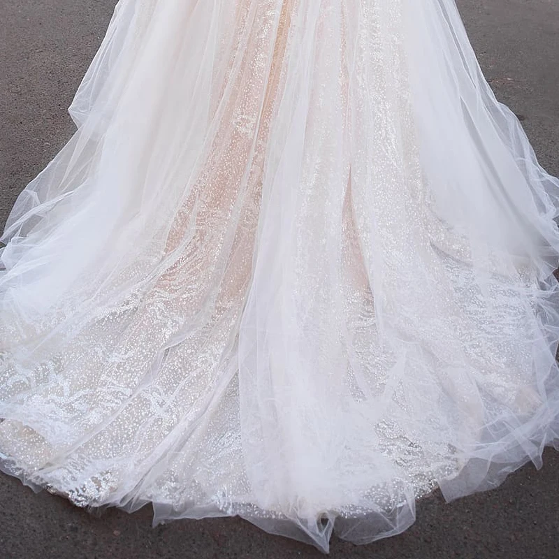 Sexy Deep V-Neck Backless Wedding Dress Elegant Chapel Train Lace Appliques Tulle Sleeveless Bridal Ball Gown Robe De Mariage 
Sexy Deep V-Neck Backless Wedding Dress Elegant Chapel Train Lace Appliques Tulle Sleeveless Bridal Ball Gown Robe De Mariage