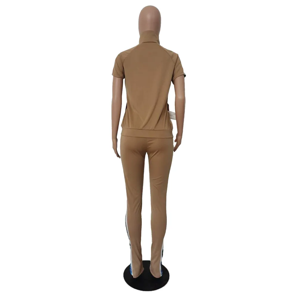 European fashion solid color casual women's sports suit loose high neck zipper short sleeve jacket and trousers
European fashion solid color casual women's sports suit loose high neck zipper short sleeve jacket and trousers