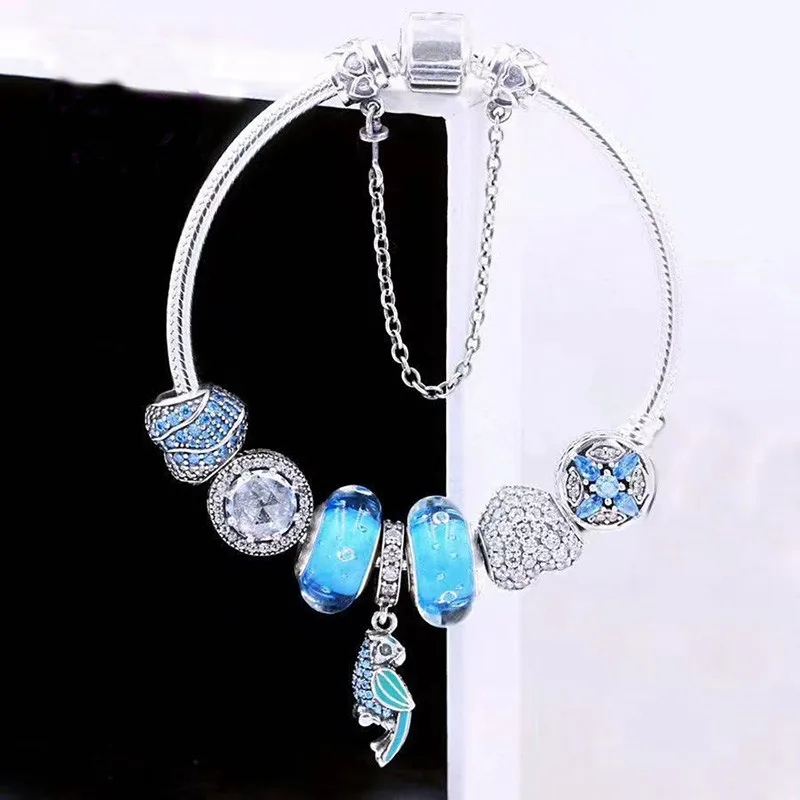 S925 Sterling Silver Blue Cz Parrot Pendant With Glass Beads And Classic Button Bracelet The Most Popular Diy Jewelry For Women
S925 Sterling Silver Blue Cz Parrot Pendant With Glass Beads And Classic Button Bracelet The Most Popular Diy Jewelry For Women