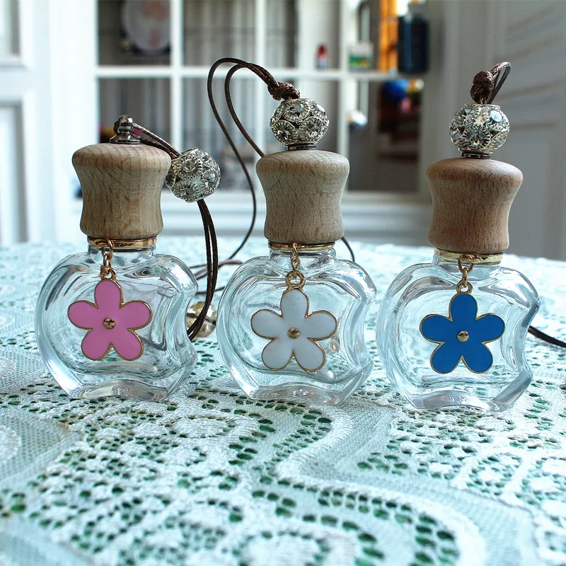 10pcs/lot High Quality 8ML Glass Perfume Bottle Car Pendant Handing Bottle Refillable Perfume Packaging Bottle with Wooden Cap
10pcs/lot High Quality 8ML Glass Perfume Bottle Car Pendant Handing Bottle Refillable Perfume Packaging Bottle with Wooden Cap