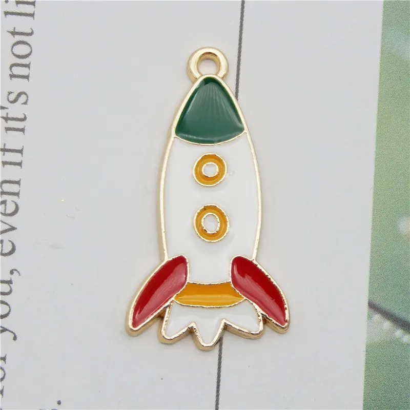 Джули Wang 4 шт. Эмаль мультфильм ракета амулеты из сплава золото тон ювелирные браслеты и кулоны делает аксессуар
Джули Wang 4 шт. Эмаль мультфильм ракета амулеты из сплава золото тон ювелирные браслеты и кулоны делает аксессуар