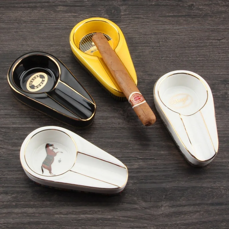 Portable Cigar Ashtray for Home Car Ceramic Single Cigar Holder Round Ash Slot 4 Colors Tobacco Cigarette Ashtray with Gift Box
Portable Cigar Ashtray for Home Car Ceramic Single Cigar Holder Round Ash Slot 4 Colors Tobacco Cigarette Ashtray with Gift Box