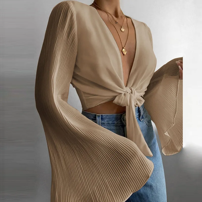 2021fashion Spring Flare Long Sleeve Beach Shirts Solid Sexy Deep V Neck Women Shirt Summer Tie-Up Hollow Out Tops Streetwear
2021fashion Spring Flare Long Sleeve Beach Shirts Solid Sexy Deep V Neck Women Shirt Summer Tie-Up Hollow Out Tops Streetwear