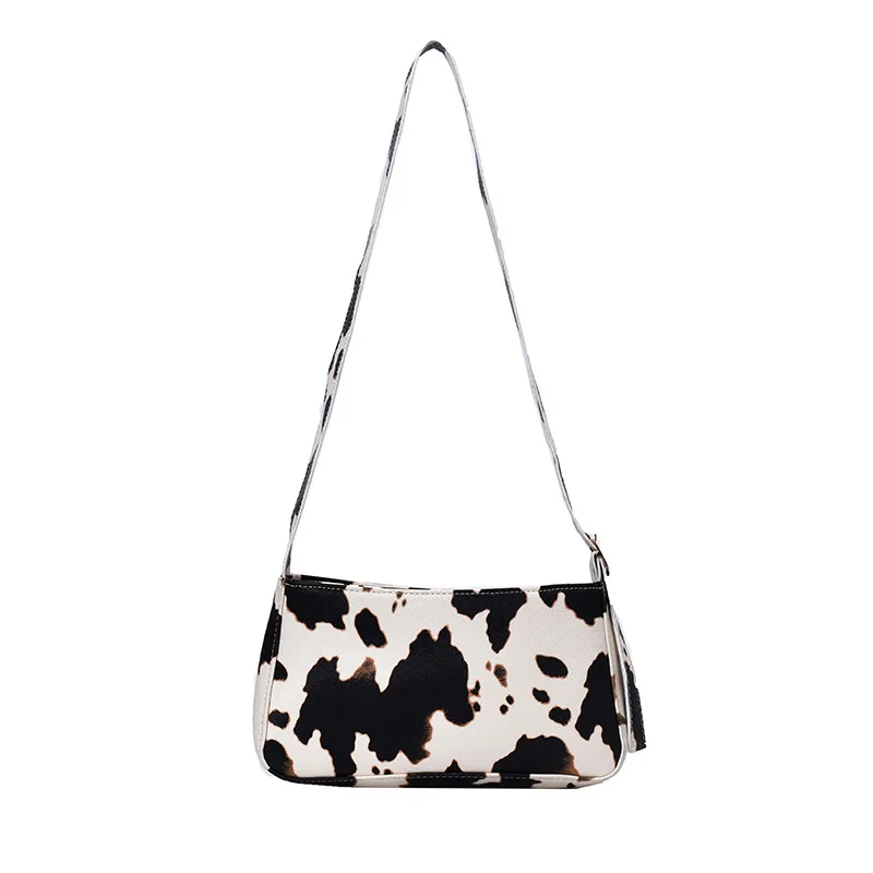 Fashion Design Milk Cow Print Women Underarm Baguette Handbags Vintage PU Leather Girls Shoulder Messenger Bags Women Armpit Bag
Fashion Design Milk Cow Print Women Underarm Baguette Handbags Vintage PU Leather Girls Shoulder Messenger Bags Women Armpit Bag