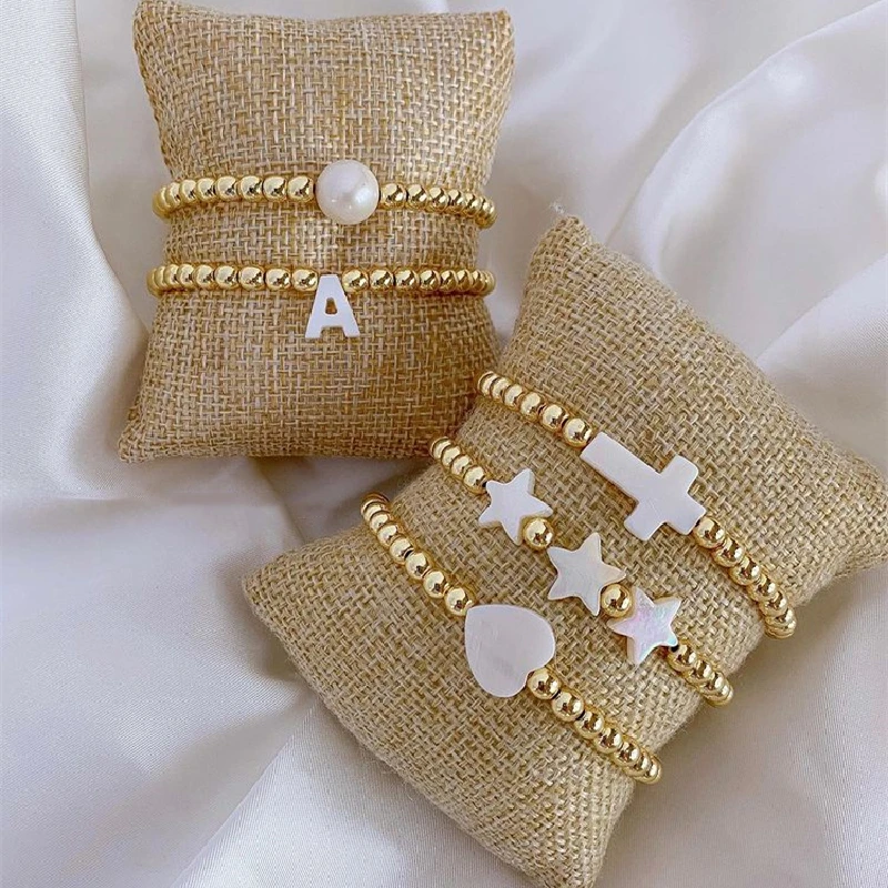 Go2Boho Shell Made Letter Heart Stars Cross Charm Bracelet Gold Color Varnish Baked Beaded Bracelets for Women Fashion Jewelry
Go2Boho Shell Made Letter Heart Stars Cross Charm Bracelet Gold Color Varnish Baked Beaded Bracelets for Women Fashion Jewelry
