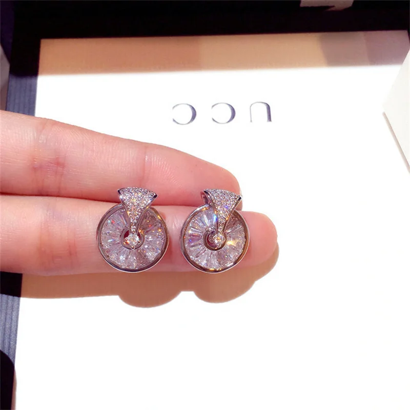 Cute Silver Color Stud Earrings with Bling Zircon Stone for Women Fashion Jewelry Korean Earrings New Wholesale
Cute Silver Color Stud Earrings with Bling Zircon Stone for Women Fashion Jewelry Korean Earrings New Wholesale