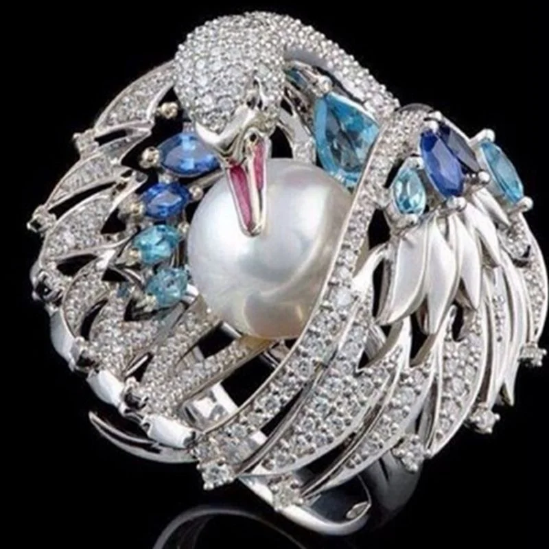 Luxury Retro White Swan Pearl Wedding Ring Ladies Engagement Ring Fashion Trend Party Gift Jewelry Personality Versatile Exquisi
Luxury Retro White Swan Pearl Wedding Ring Ladies Engagement Ring Fashion Trend Party Gift Jewelry Personality Versatile Exquisi