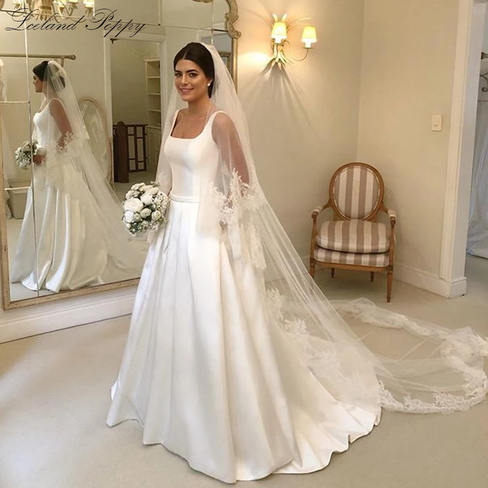 Lceland Poppy Elegant A-line Square Neck Satin Wedding Dresses Vestido de Noiva Sleeveless V Back Floor Length Bridal Gowns
Lceland Poppy Elegant A-line Square Neck Satin Wedding Dresses Vestido de Noiva Sleeveless V Back Floor Length Bridal Gowns