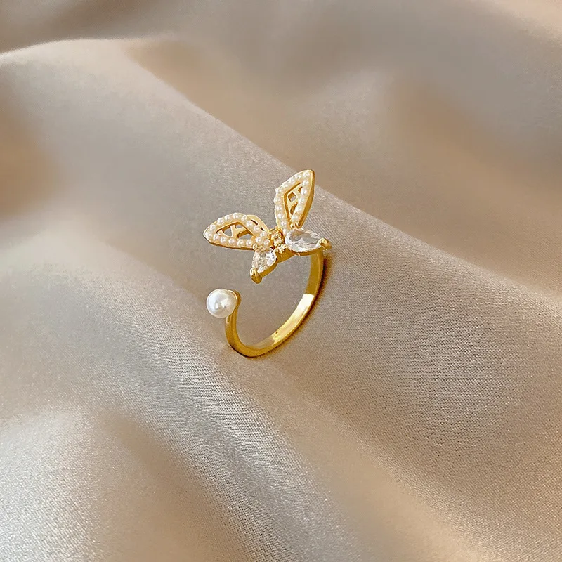 2021 Trend Pearl Butterfly Adjustable Ring For Women Fashion Korean Style Gold Plated Finger Rings Girls Jewelry Gift Cool Stuff 
2021 Trend Pearl Butterfly Adjustable Ring For Women Fashion Korean Style Gold Plated Finger Rings Girls Jewelry Gift Cool Stuff