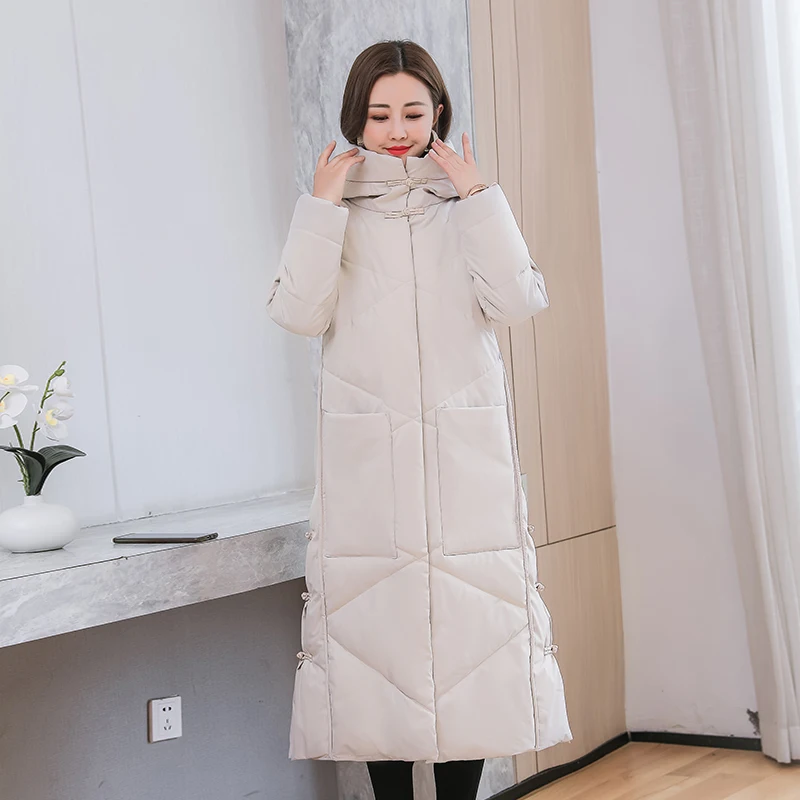 Retro Padded Down Coat Women 2021 Winter New National Style Loose Warm Long Over-the-knee Padded Jacket 
Retro Padded Down Coat Women 2021 Winter New National Style Loose Warm Long Over-the-knee Padded Jacket
