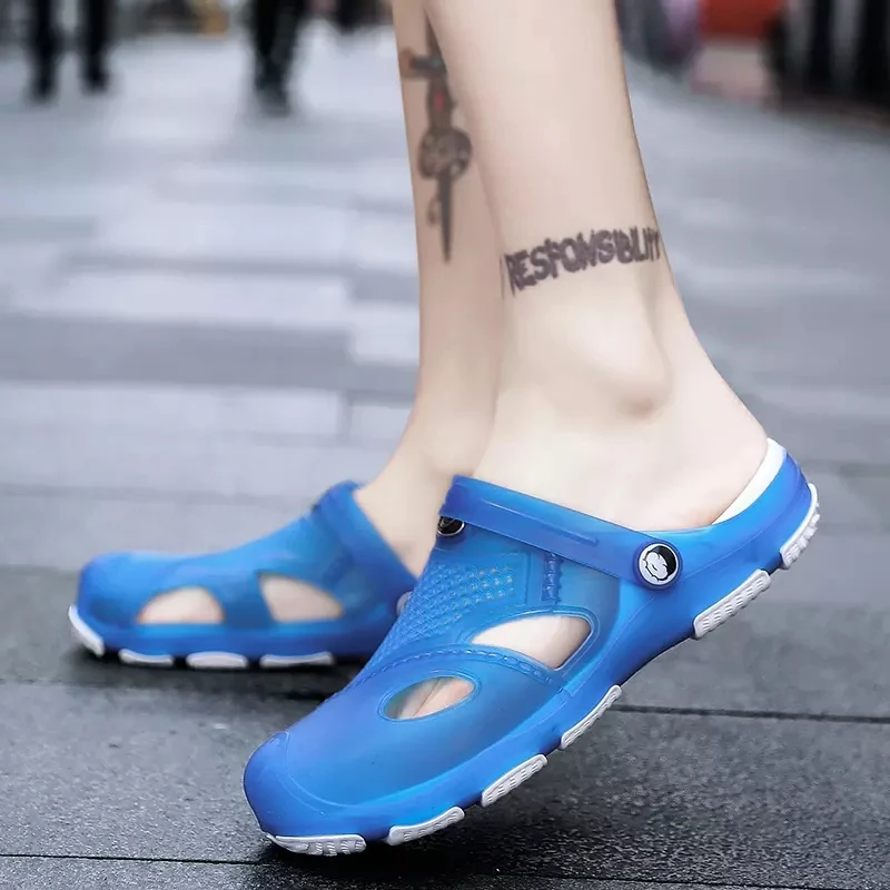 Men's Summer Sandals Baotou Hollow Air Hole Dongdong Shoes Comfortable Antiskid Dual Purpose Beach Shoes Slippers Jelly Shoes
Men's Summer Sandals Baotou Hollow Air Hole Dongdong Shoes Comfortable Antiskid Dual Purpose Beach Shoes Slippers Jelly Shoes