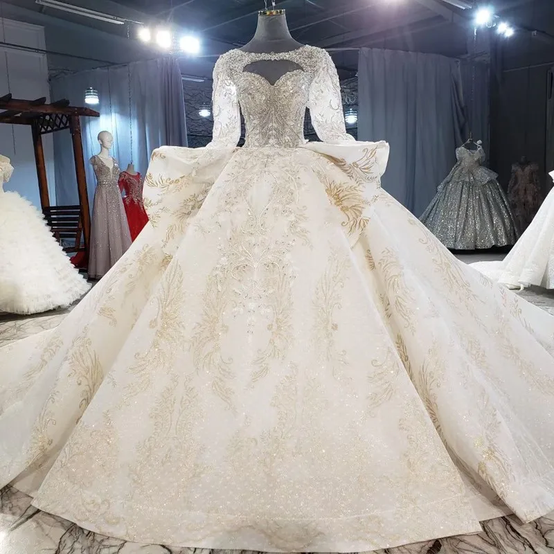 Amazing Ball Gown Champange Gold Lace Wedding Dress High Quality Necklace Bridal Gown 2021 New Design Long Sleeve Wedding Gown
Amazing Ball Gown Champange Gold Lace Wedding Dress High Quality Necklace Bridal Gown 2021 New Design Long Sleeve Wedding Gown