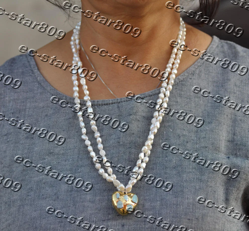 Z11520 2Row 32" 27mm White Baroque Pearl Necklace Gilded Heart Aquamarine Pendant
Z11520 2Row 32" 27mm White Baroque Pearl Necklace Gilded Heart Aquamarine Pendant