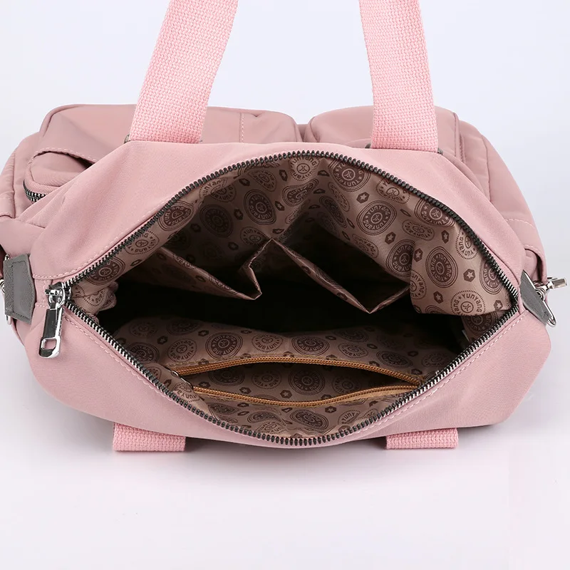 S.IKRR Waterproof Nylon Weekend Bag Travel Bags For Women Solid Color Gym Fitness Handbag Lady Big Shoulder Bag Female Duffle 
S.IKRR Waterproof Nylon Weekend Bag Travel Bags For Women Solid Color Gym Fitness Handbag Lady Big Shoulder Bag Female Duffle