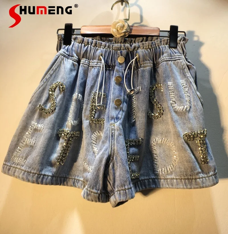 2021 Summer New Beaded Diamond Letters Baggy Denim Shorts Female Light Blue Drawstring Elastic Waist Wide Leg Pants for Women
2021 Summer New Beaded Diamond Letters Baggy Denim Shorts Female Light Blue Drawstring Elastic Waist Wide Leg Pants for Women