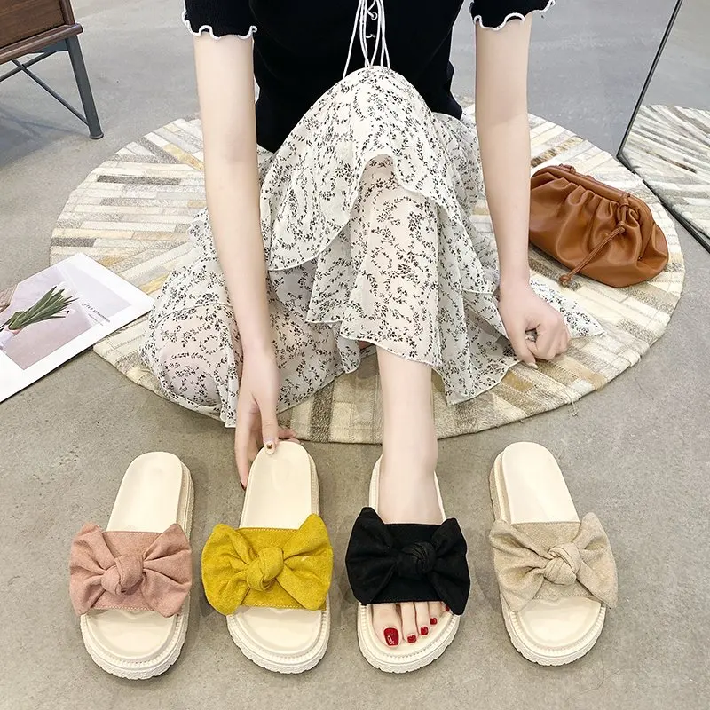 Suede bow-knot flip-flop women's summer 2021 new Korean version of wild thick-soled anti-skid sandals and slippers
Suede bow-knot flip-flop women's summer 2021 new Korean version of wild thick-soled anti-skid sandals and slippers