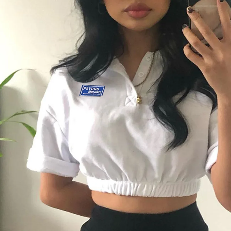 Letter Embroidery White Crop T Shirt Sexy Fashion 2021 Button Summer T Shirts Casual Turn Down Collar Open Navel Women T Shirt
Letter Embroidery White Crop T Shirt Sexy Fashion 2021 Button Summer T Shirts Casual Turn Down Collar Open Navel Women T Shirt